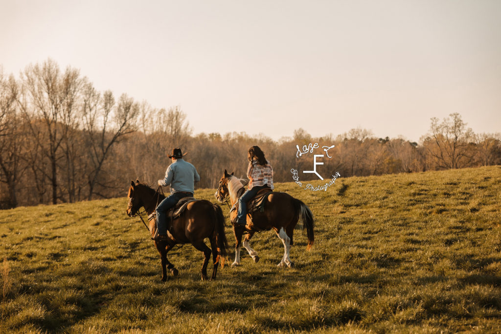 cowboy and wife riding away