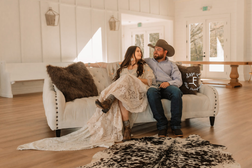 western couple sitting on couch