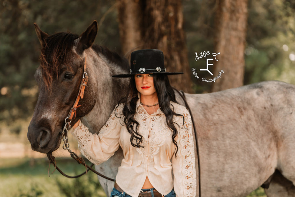 vintage cowgirl with horse