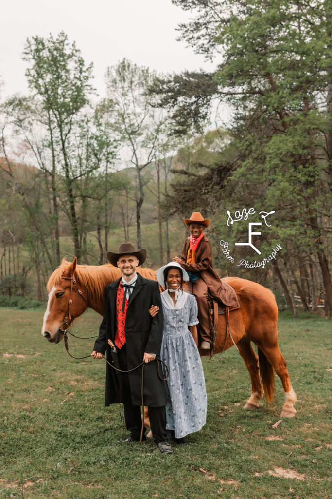 old fashioned western family with horse