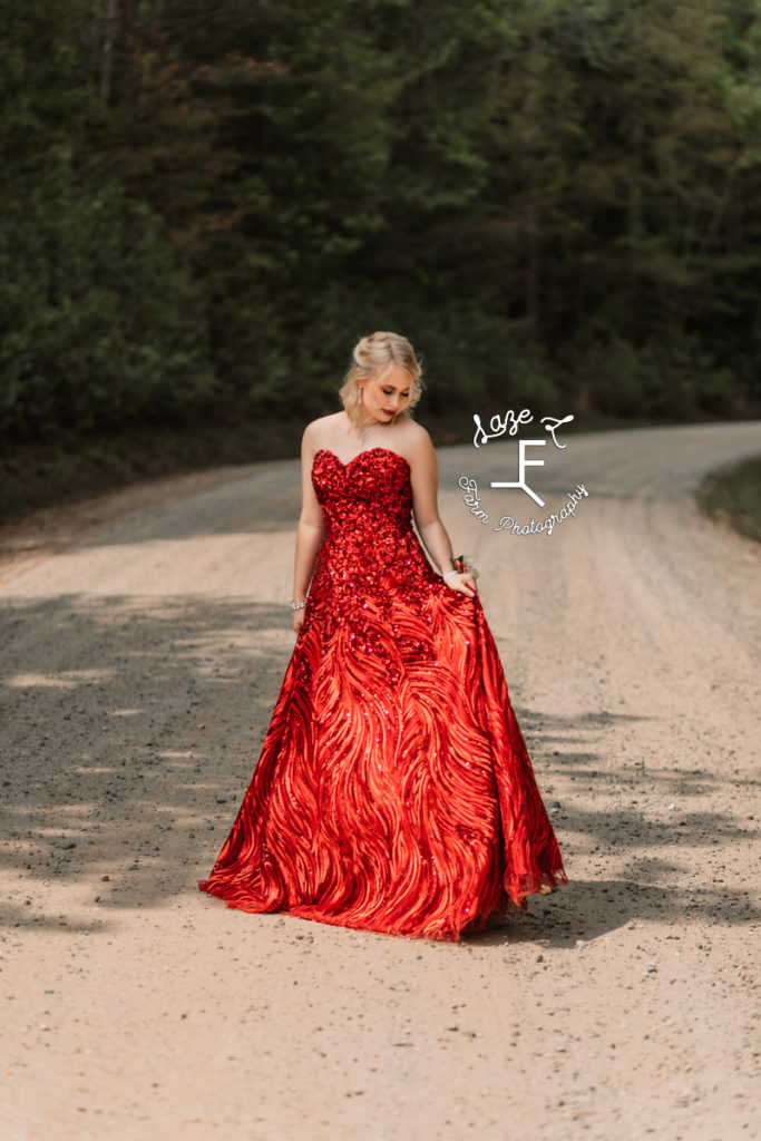 high school girl in red prom dress