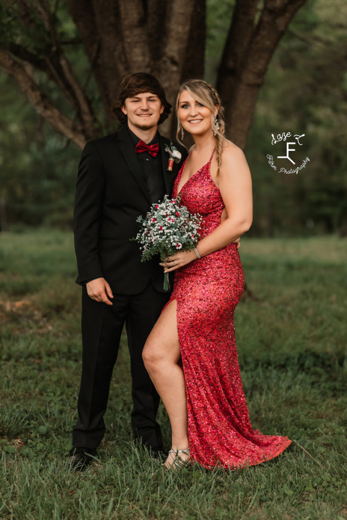 prom couple in red