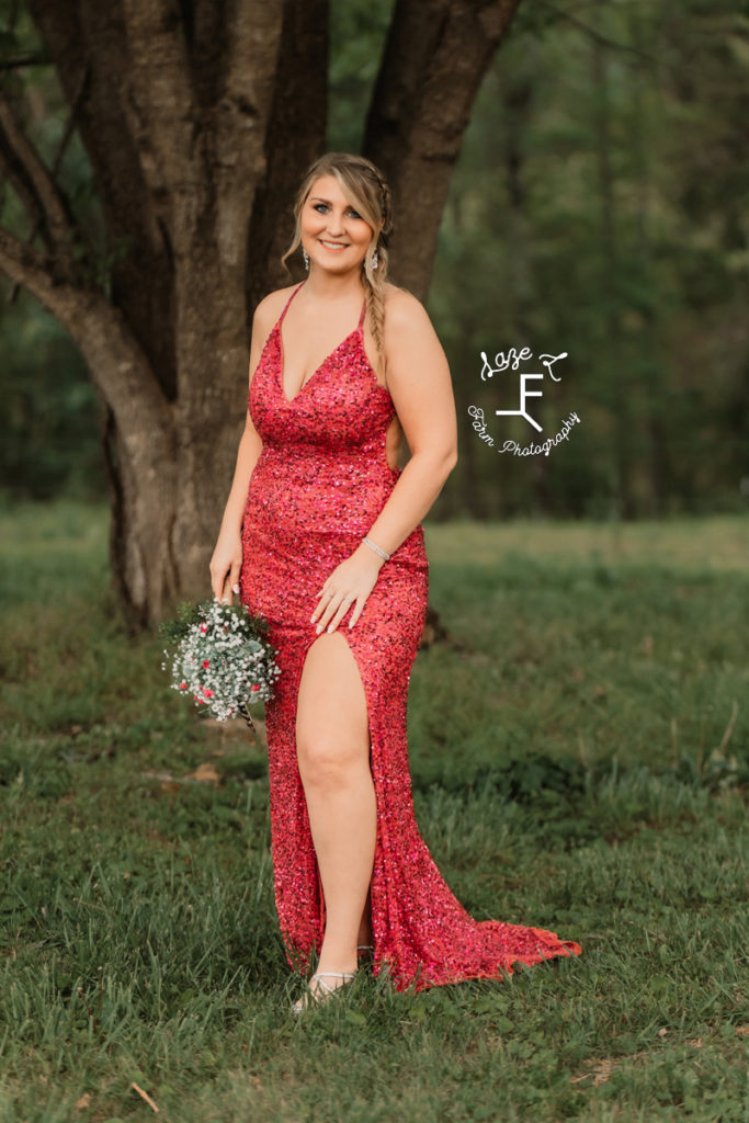 high school girl in red sparkle dress