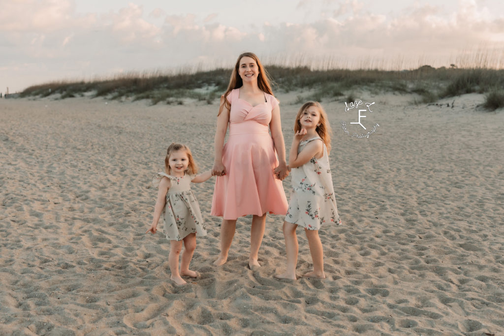 girls with mom in pink dress