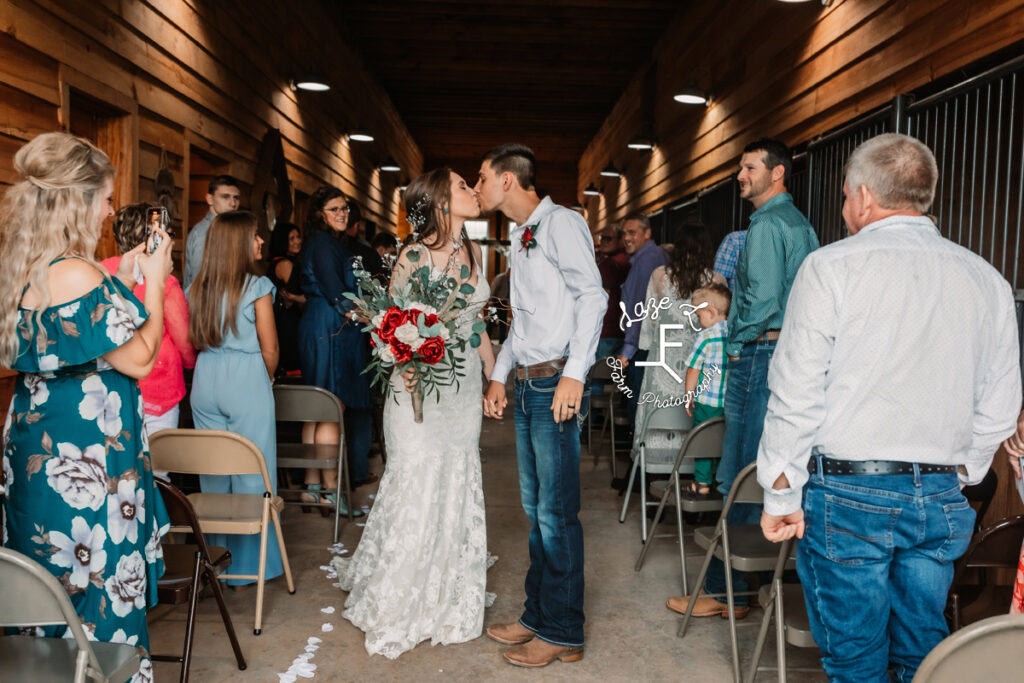 LD Kiss at the end of the aisle