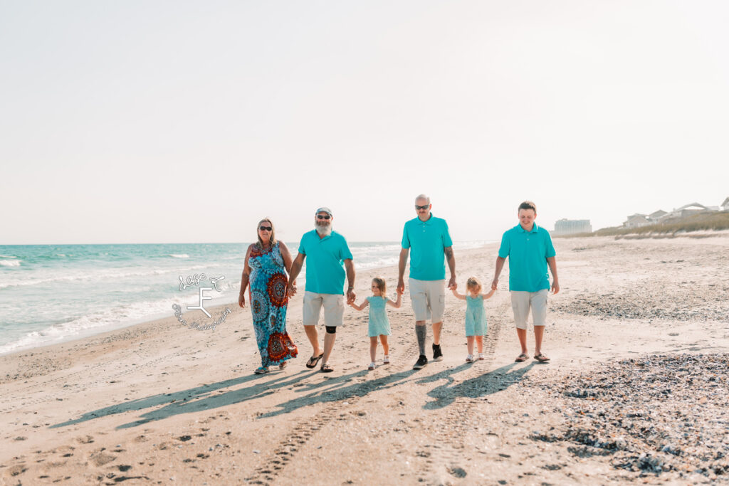 entire family walking on beach