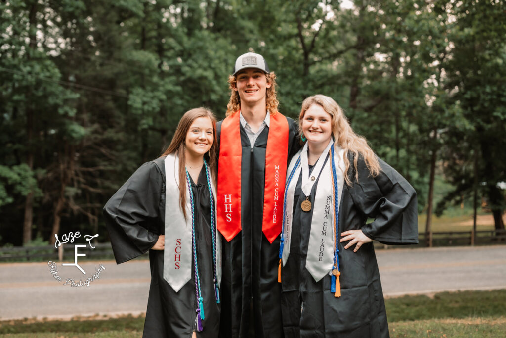 Senior Brother/Sister and Brother's girlfriend in gowns