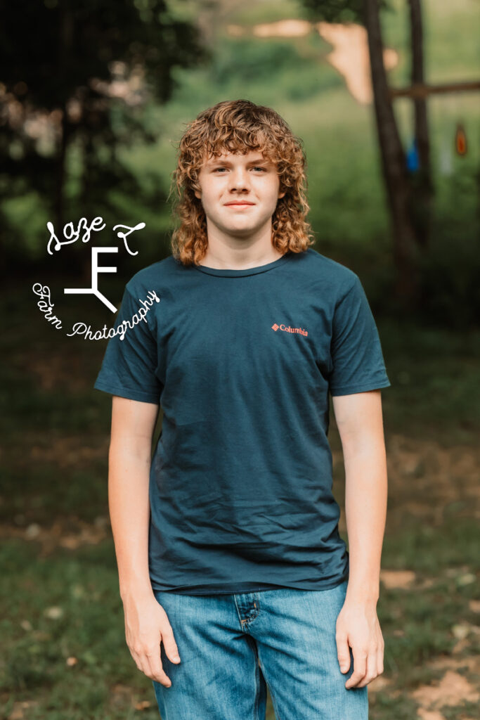 teen boy with curly mullet