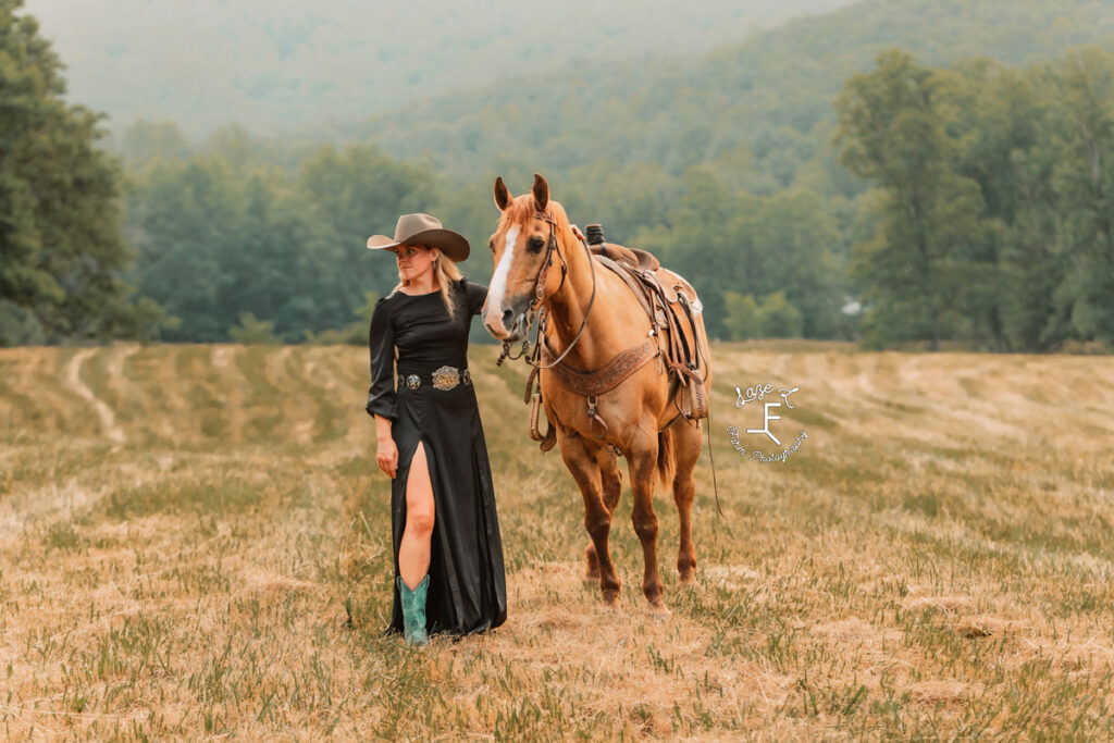 cowgirl in black dress and turquoise boots with dunn horse
