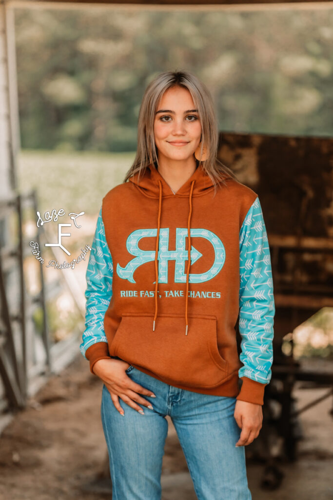 model in rust and aqua rocket donkey hoodie