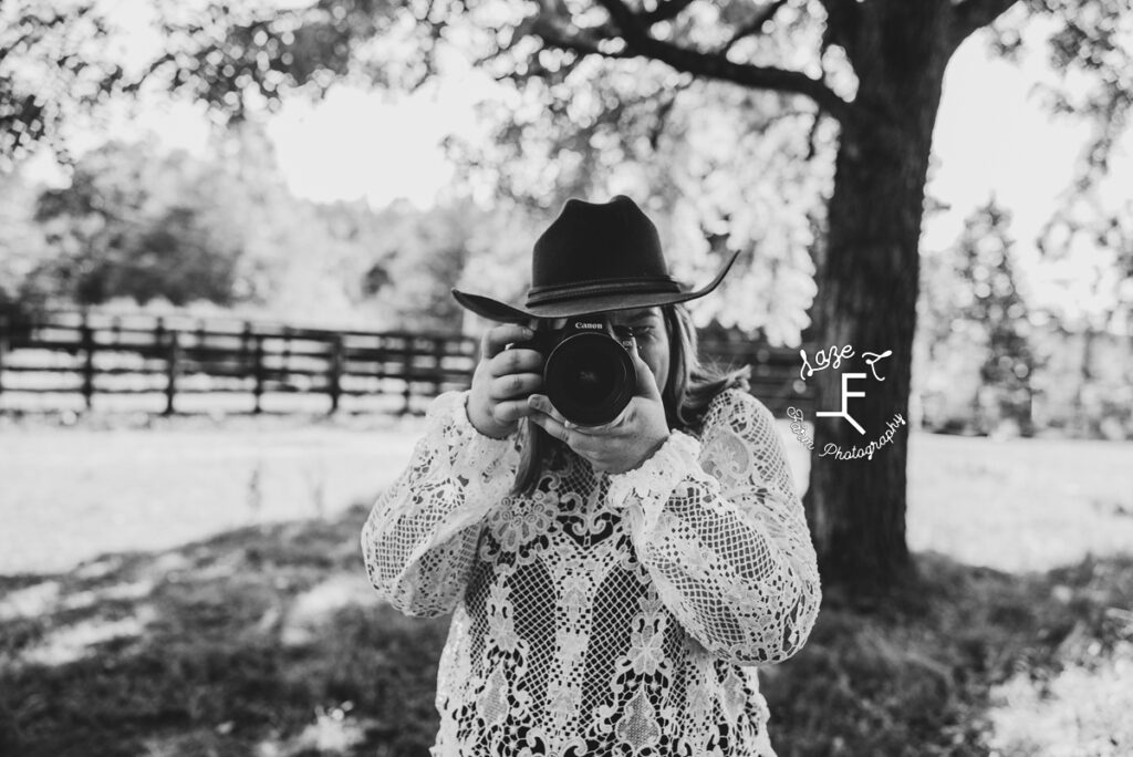 cowgirl photographer in black and white
