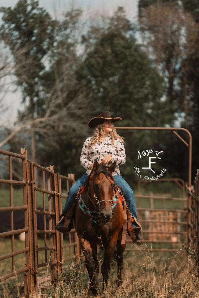 Cowgirl riding horse