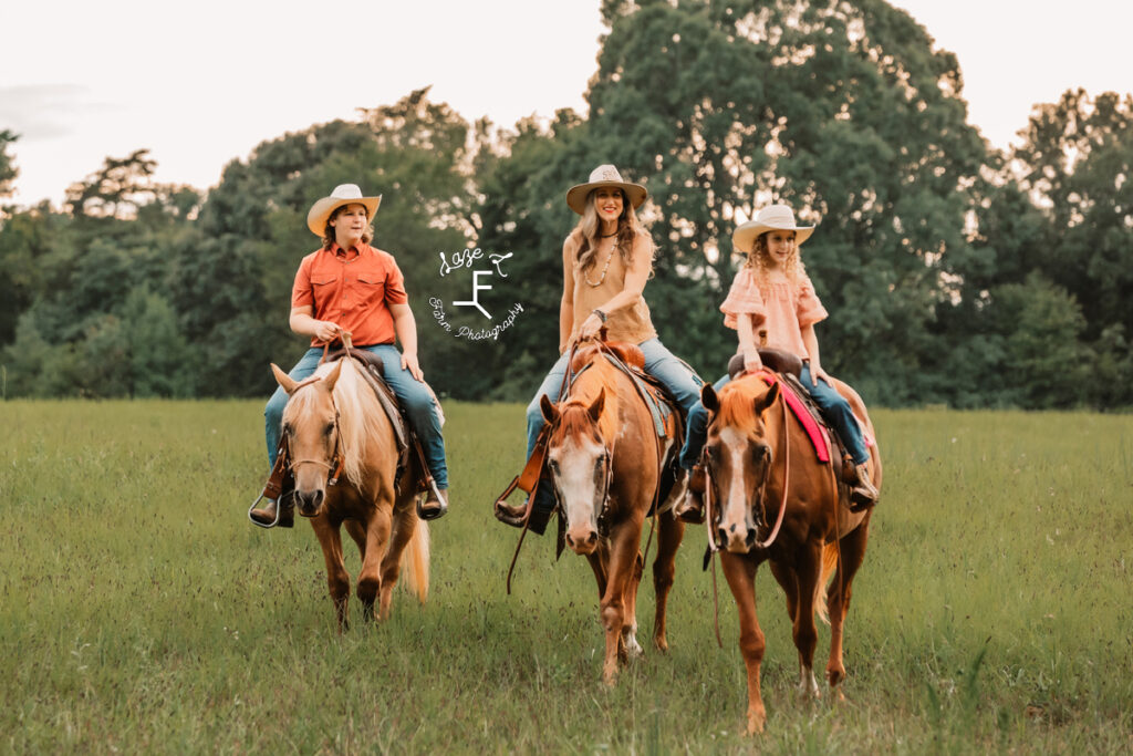 mom with 2 other kids on horseback