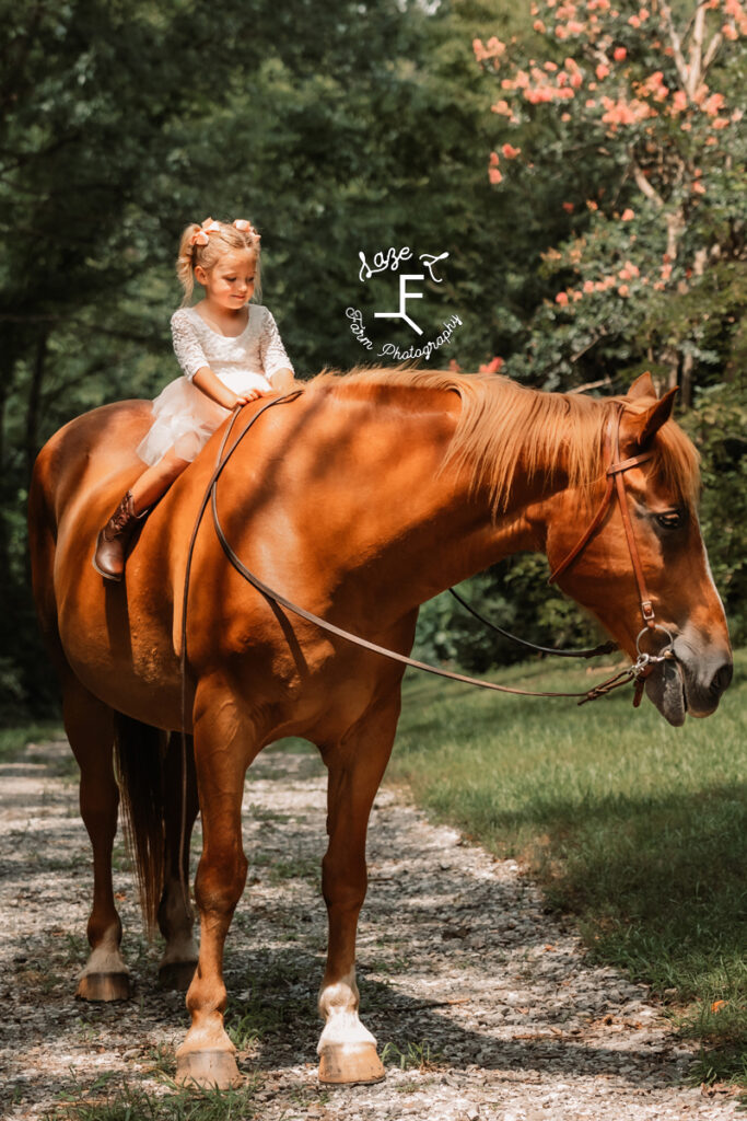 little cowgirl riding horse