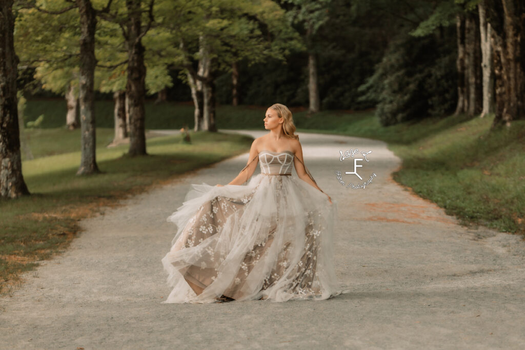 Model walking on tree lined path