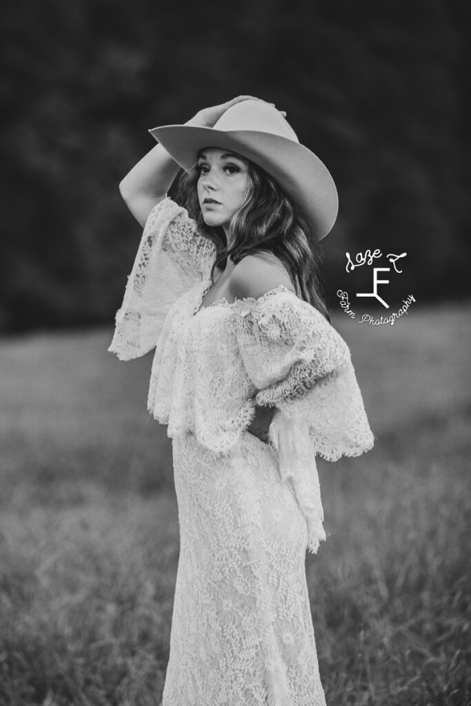 cowgirl bride looking to the left in black and white