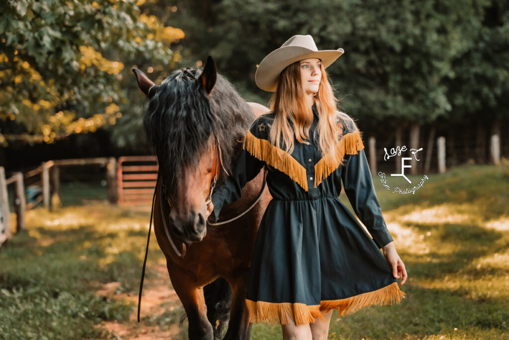 vintage cowgirl with shire cross horse