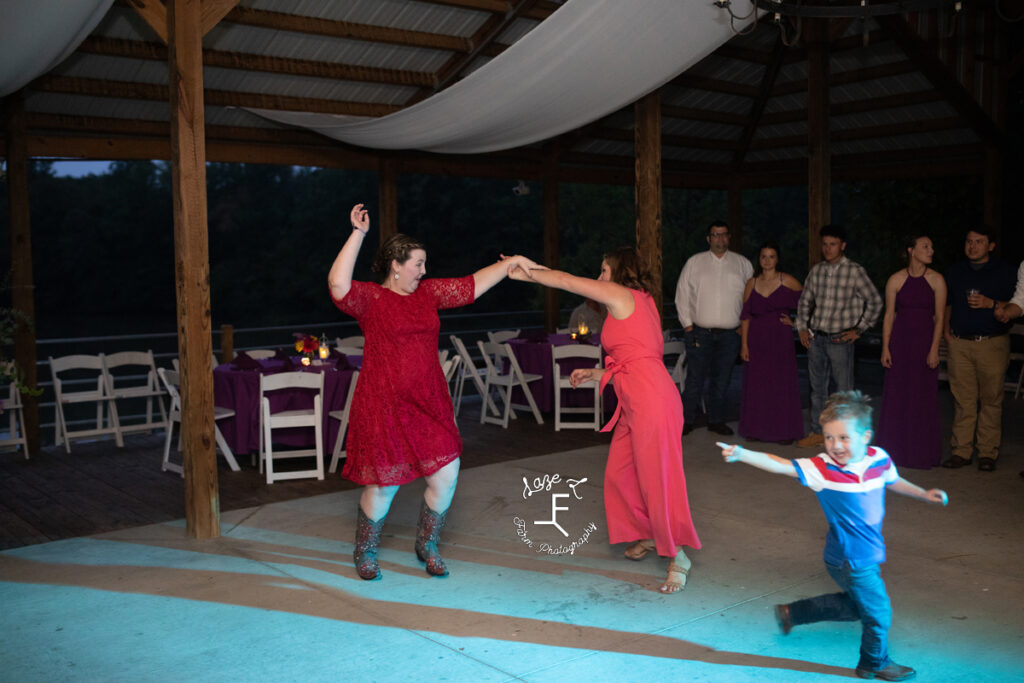 bride dancing with friend
