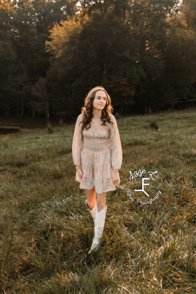 oldest daughter walking in field