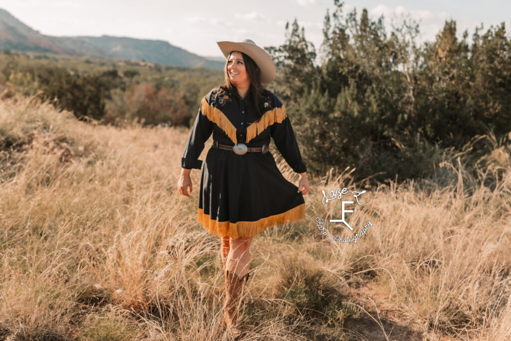 brunette cowgirl in vintage blue and gold dress