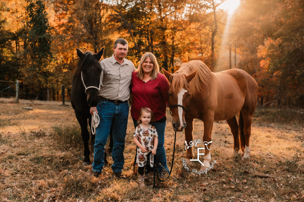 Family of 3 with horses