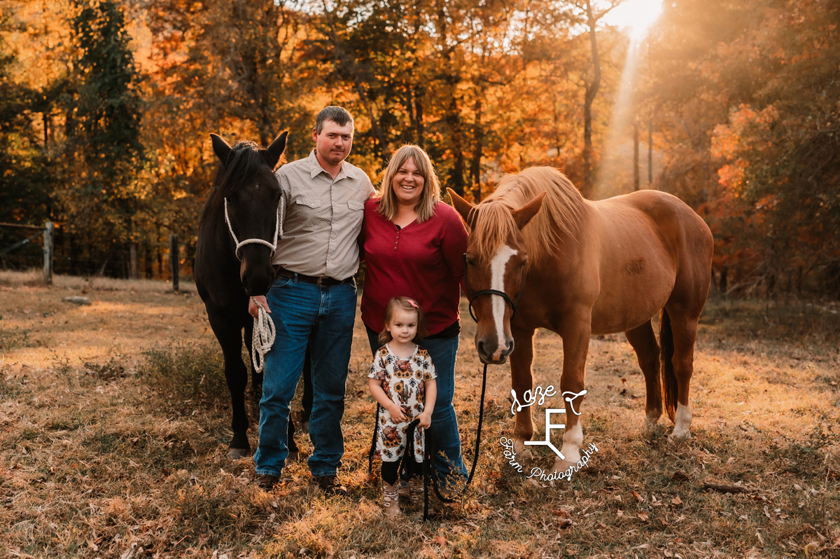 Family of 3 with horses