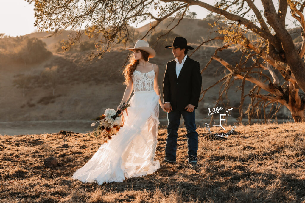 western bride looking away and husband looking at her