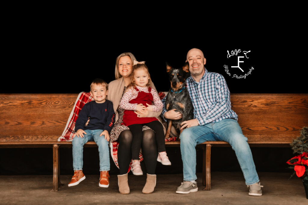 Family of 4 with their blue heeler