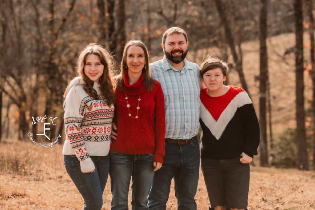 Family of 4 standing together