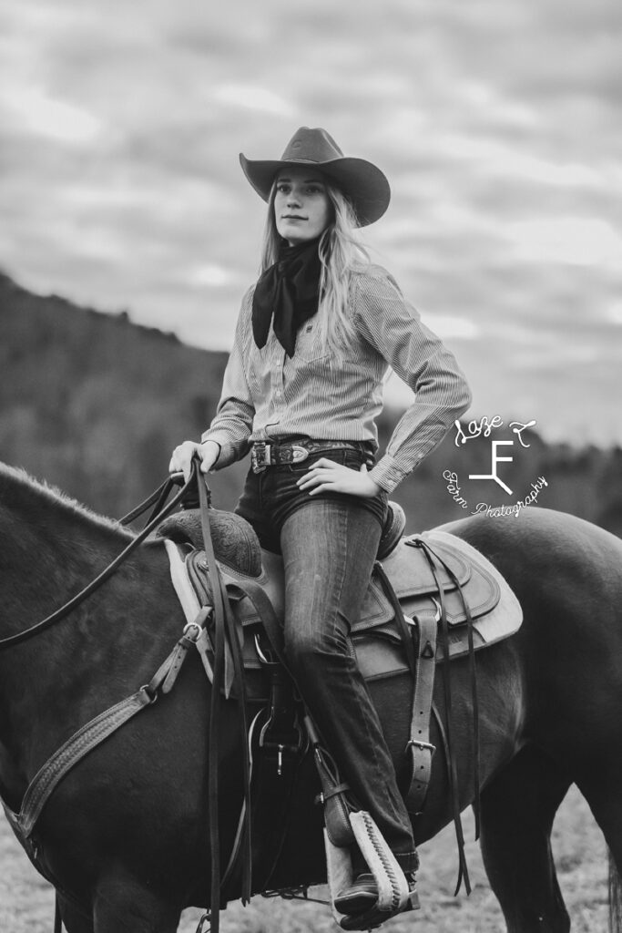 cowgirl looking to the distance in black and white