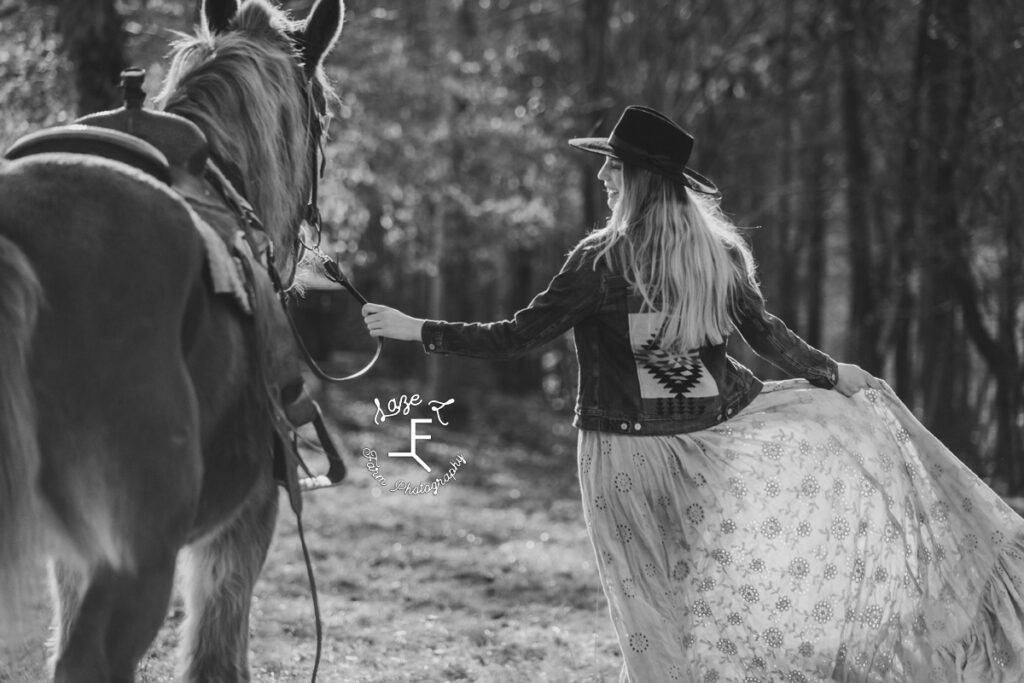 Rylan walking away with Dolly in black and white