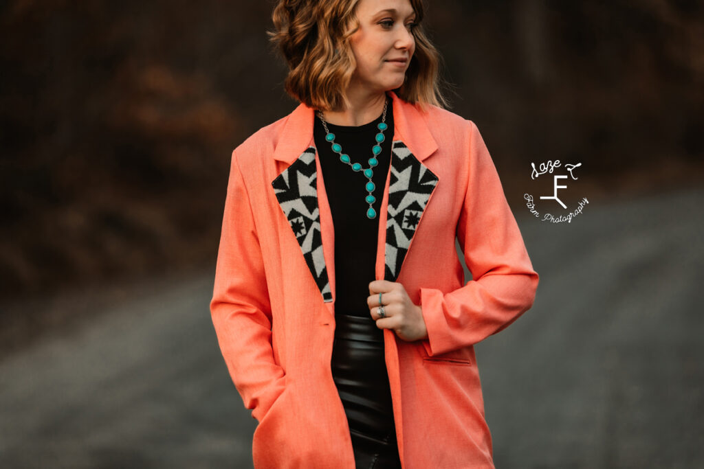 close up of pink blazer with black design