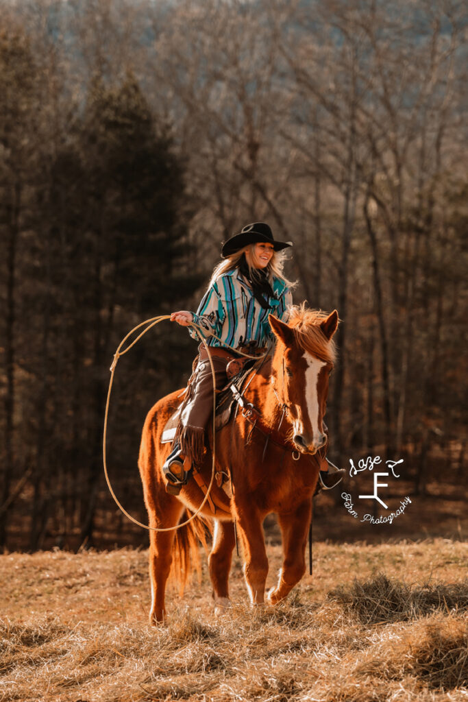 Maria riding Gus with rope in loop