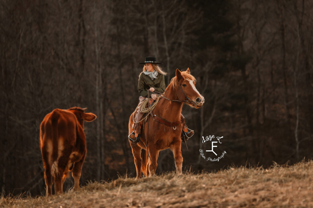 Maria riding Gus with brown cow