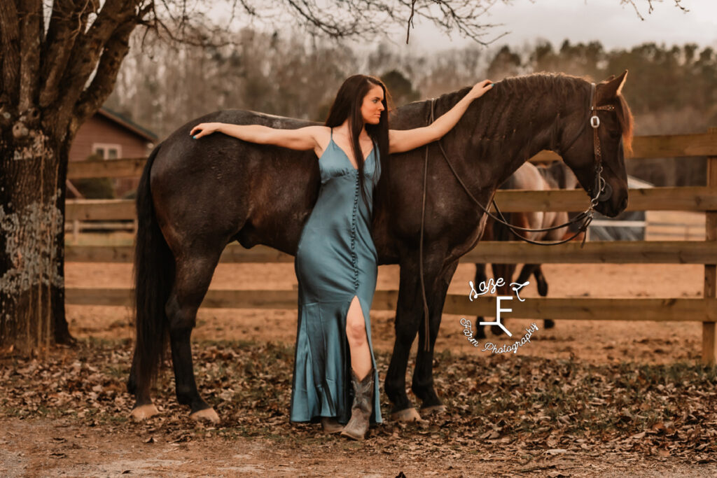 Danielle standing in blue dress with Chex