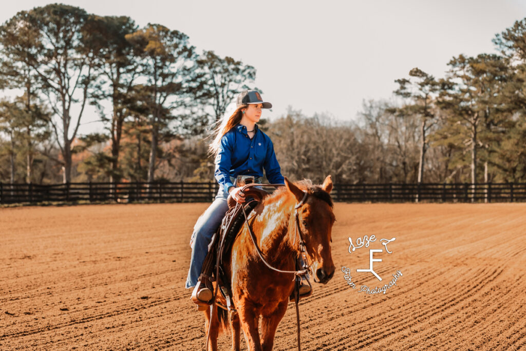 Toyie riding looking left