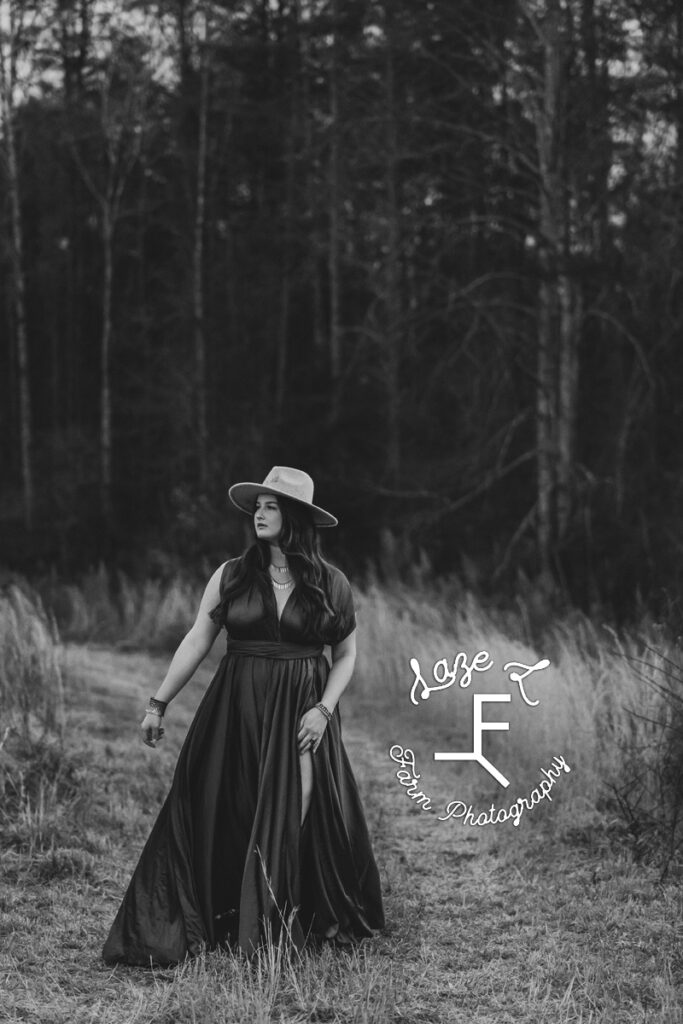 Savannah walking in dress in black and white
