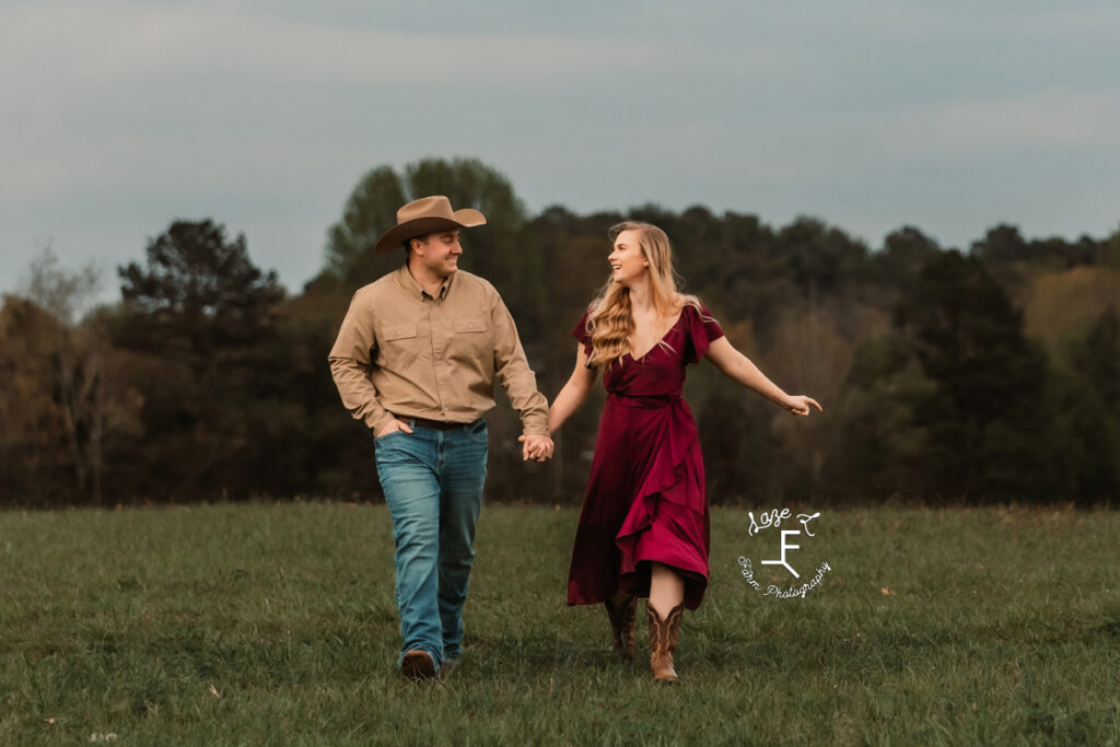 Morgan and Tanner walking in field
