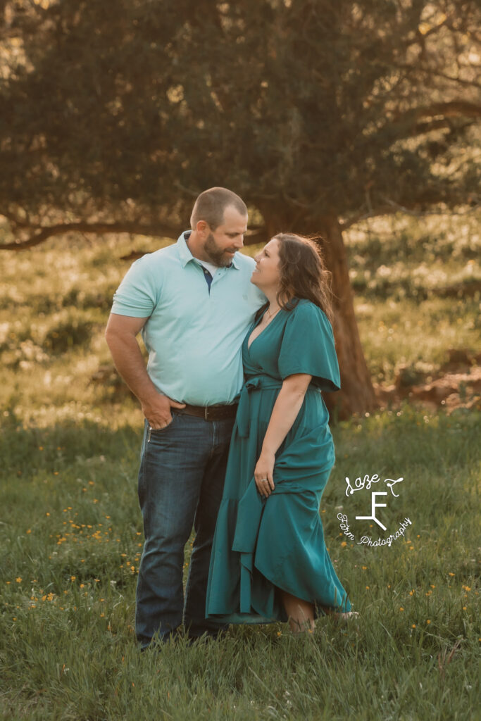 Shane and Jenna standing looking at each other