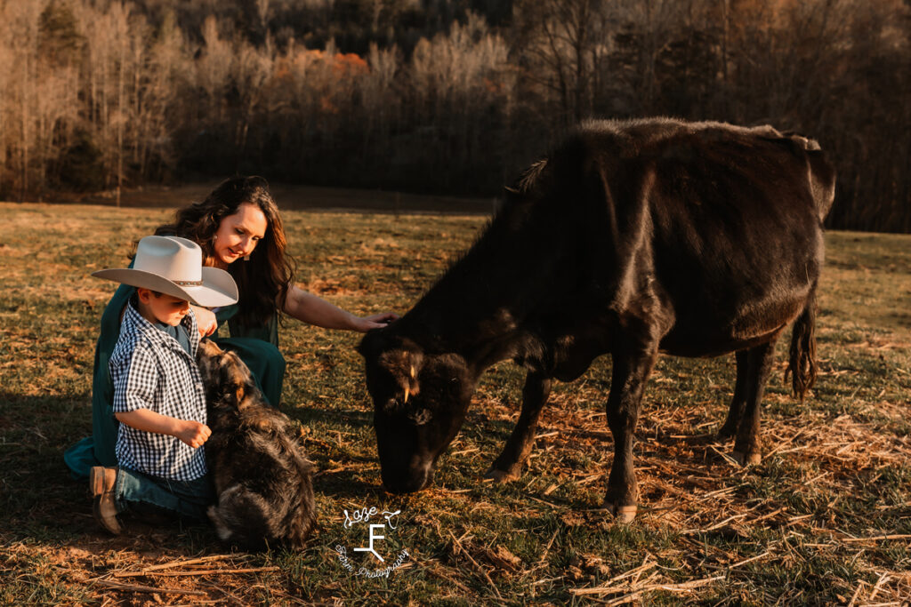 Danielle and Cade with Scruffy and a mama cow