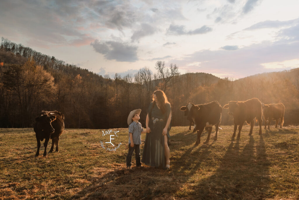 Danielle and Cade walking through field