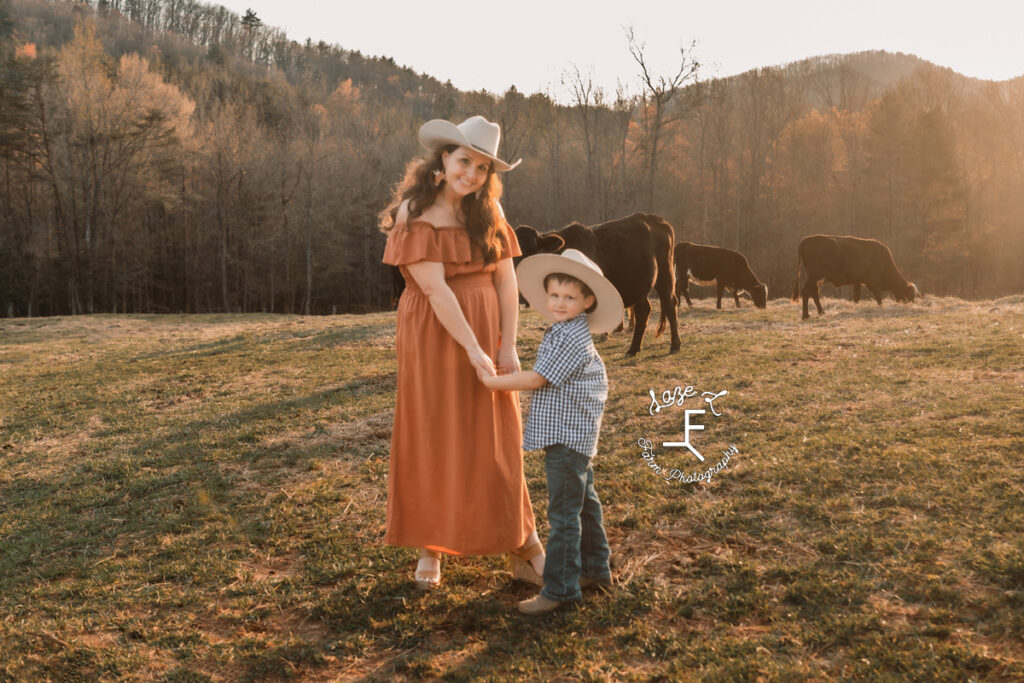 Danielle and Cade holding hands standing together