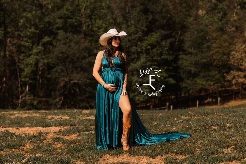 Kirstan in turquoise dress with cowboy hat