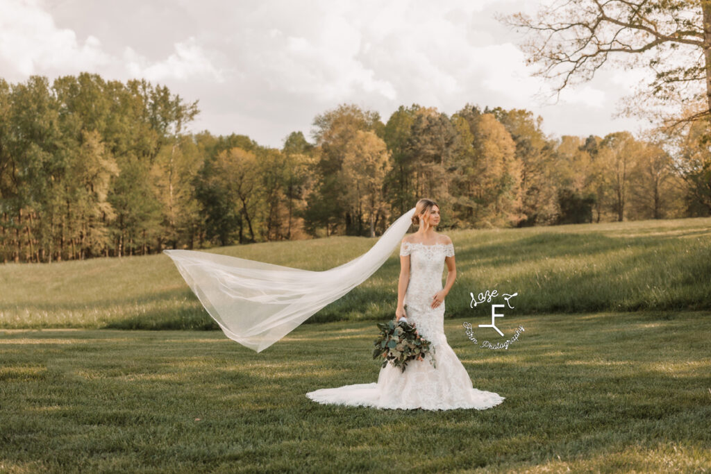 Payton with veil blowing in the wind