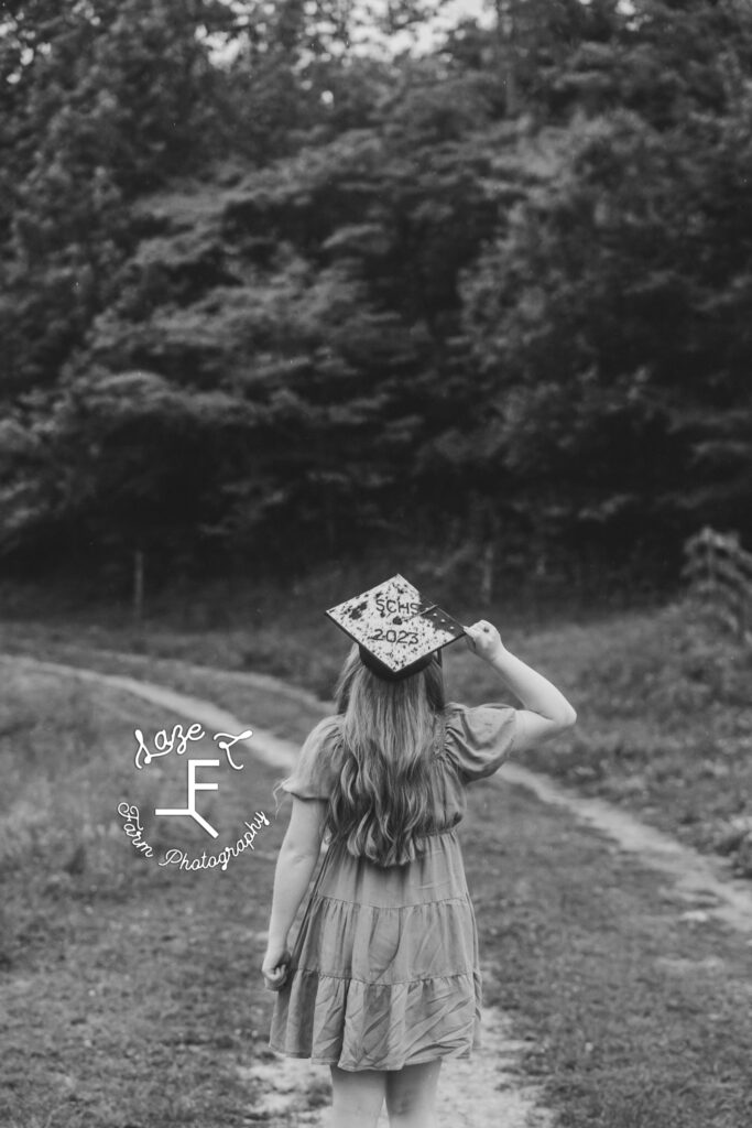 Bailey touching cap in black and white