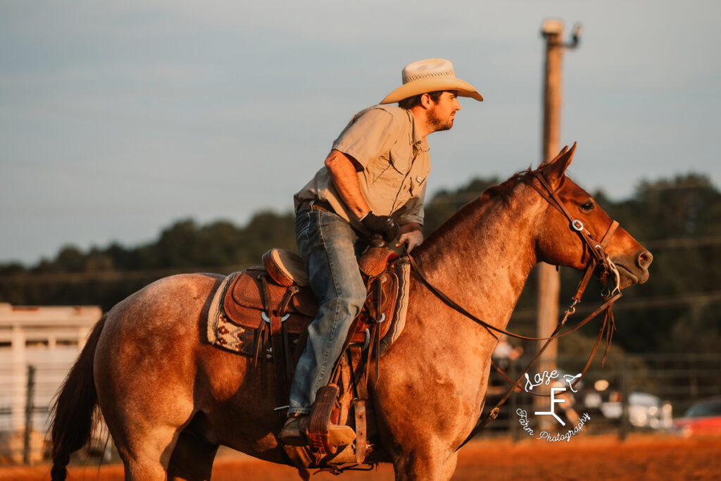 Team roper on his horse