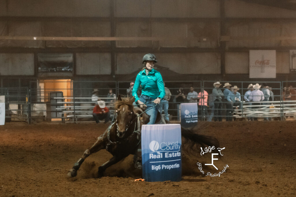 Slack Barrel racer in teal shirt