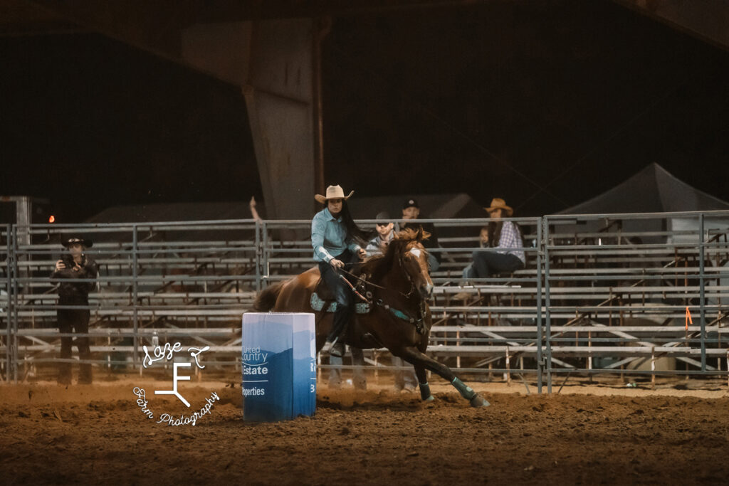 Slack Barrel Racer in blue shirt