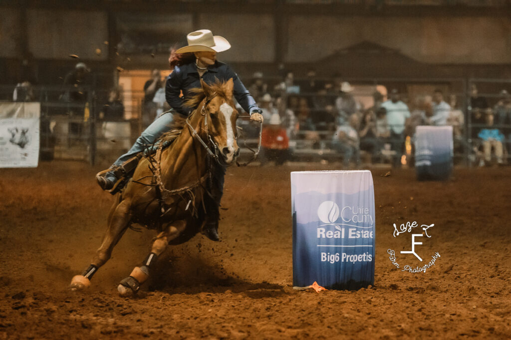 Barrel Racer on brown horse