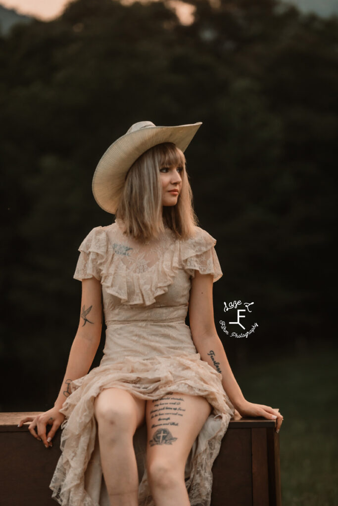 cowgirl sitting on a piano